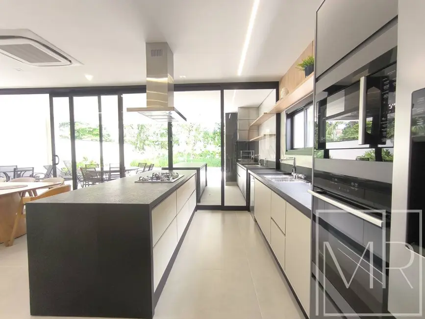 Foto 9 de Casa com 5 quartos à venda, 420m2 em Riviera de São Lourenço, Bertioga - SP