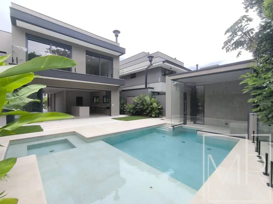 Foto 1 de Casa com 6 quartos à venda, 489m2 em Riviera de São Lourenço, Bertioga - SP