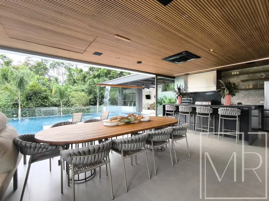 Foto 1 de Casa com 7 quartos à venda, 600m2 em Riviera de São Lourenço, Bertioga - SP
