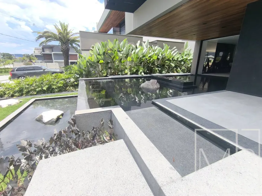 Foto 3 de Casa com 7 quartos à venda, 1289m2 em Riviera de São Lourenço, Bertioga - SP