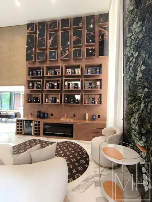 Foto 3 de Casa com 6 quartos à venda, 550m2 em Riviera de São Lourenço, Bertioga - SP