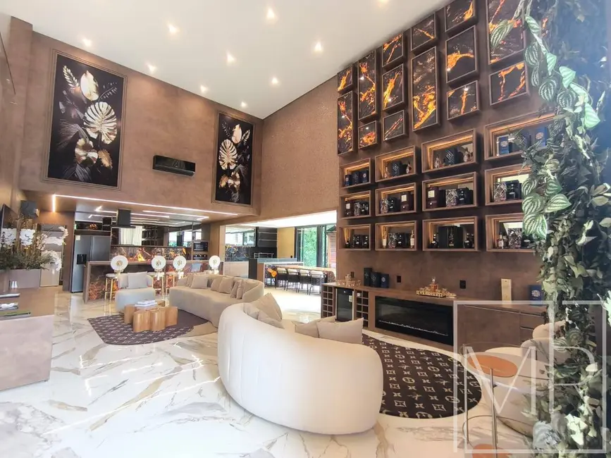 Foto 4 de Casa com 6 quartos à venda, 550m2 em Riviera de São Lourenço, Bertioga - SP