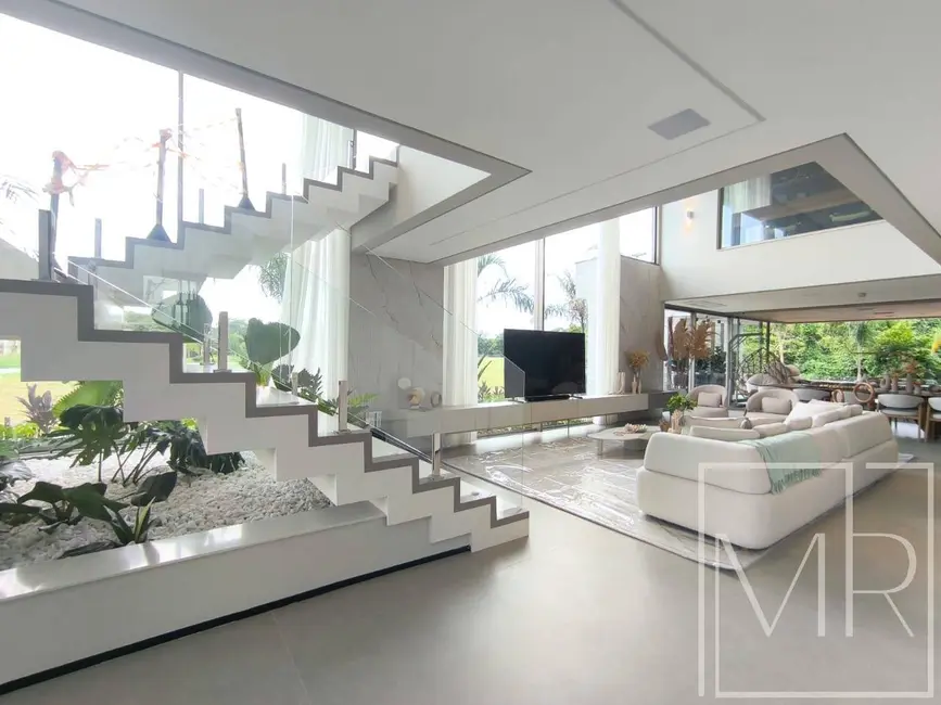 Foto 3 de Casa com 7 quartos à venda, 618m2 em Riviera de São Lourenço, Bertioga - SP