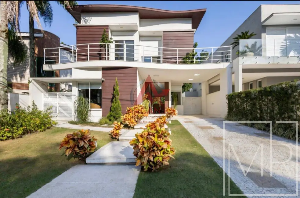 Foto 2 de Casa com 6 quartos à venda, 326m2 em Riviera de São Lourenço, Bertioga - SP