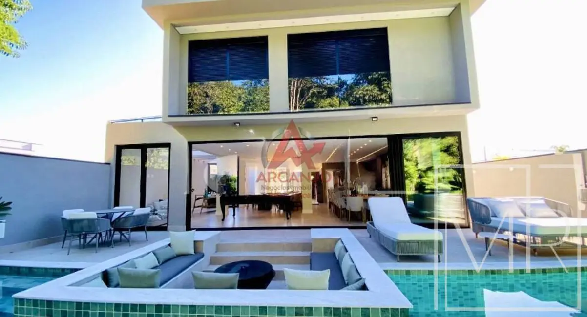 Casa com 6 quartos à venda, 420m2 em Riviera de São Lourenço, Bertioga - SP - imagem 1 Foto 1 de Casa com 6 quartos à venda, 420m2 em Riviera de São Lourenço, Bertioga - SP