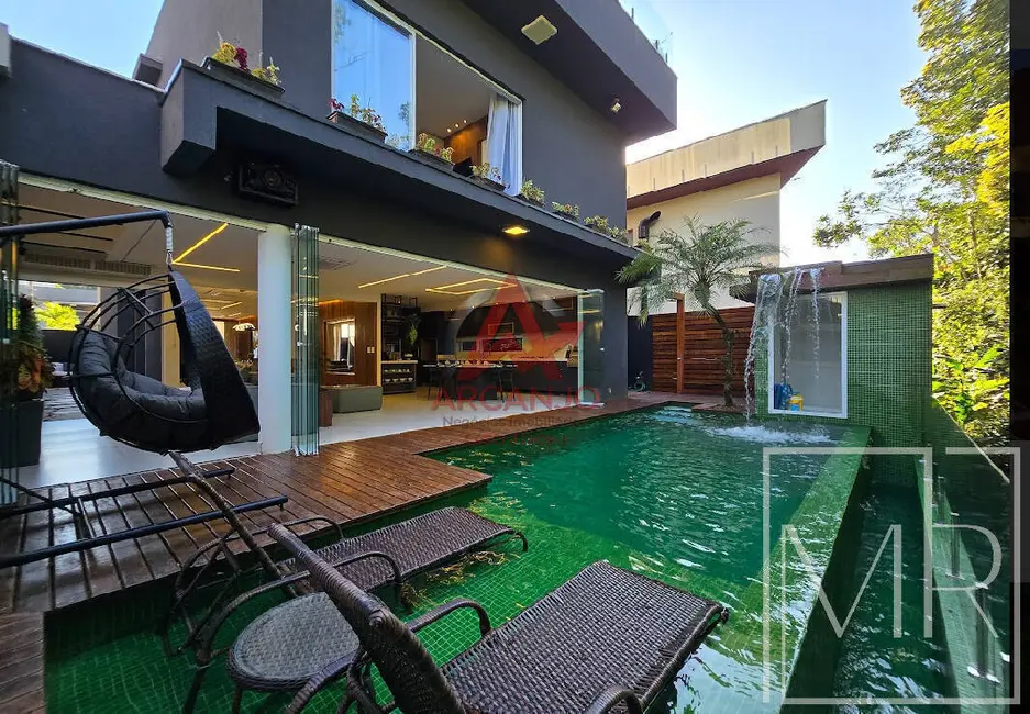 Foto 1 de Casa com 7 quartos à venda, 450m2 em Riviera de São Lourenço, Bertioga - SP