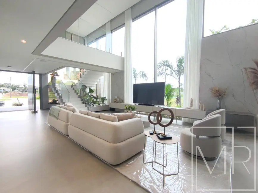 Foto 4 de Casa com 7 quartos à venda, 618m2 em Riviera de São Lourenço, Bertioga - SP