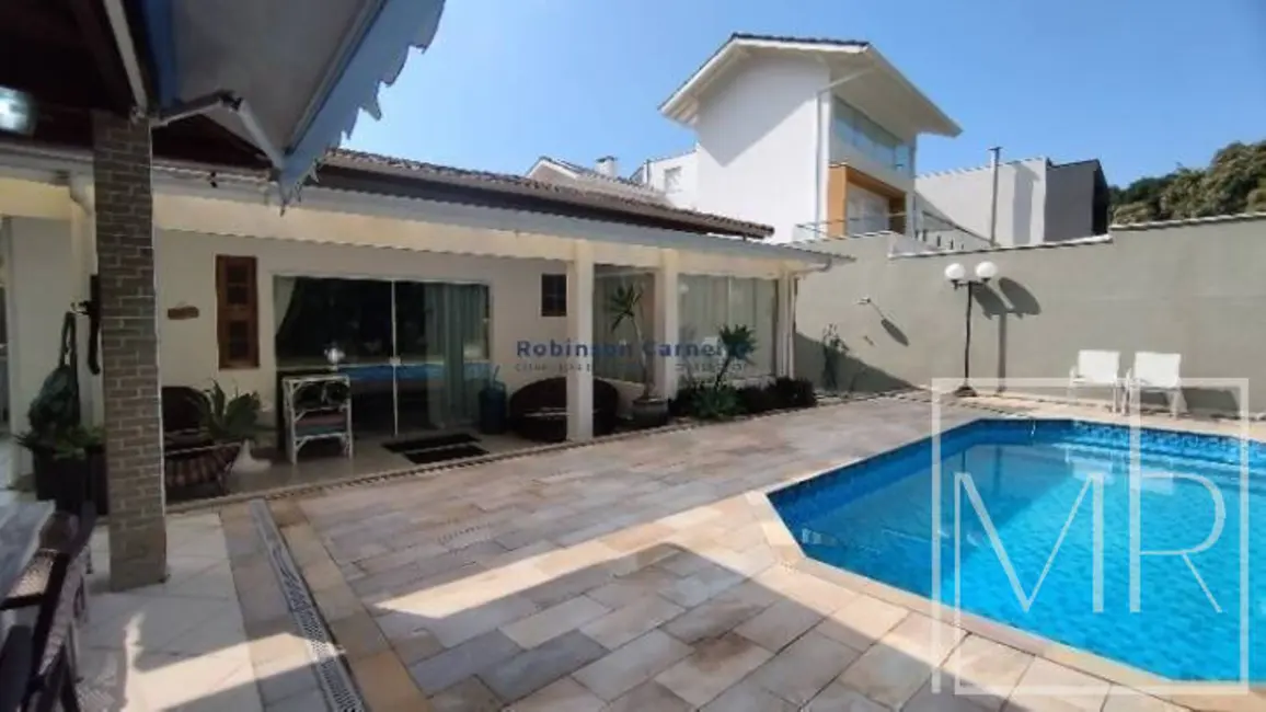 Foto 1 de Casa com 4 quartos à venda, 209m2 em Riviera de São Lourenço, Bertioga - SP