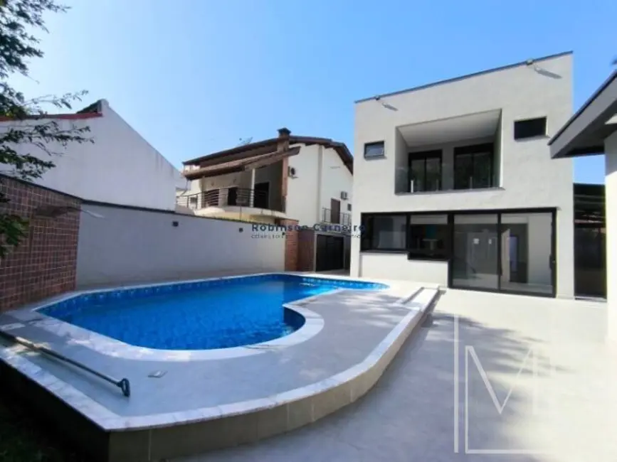 Foto 9 de Casa com 5 quartos à venda, 309m2 em Riviera de São Lourenço, Bertioga - SP