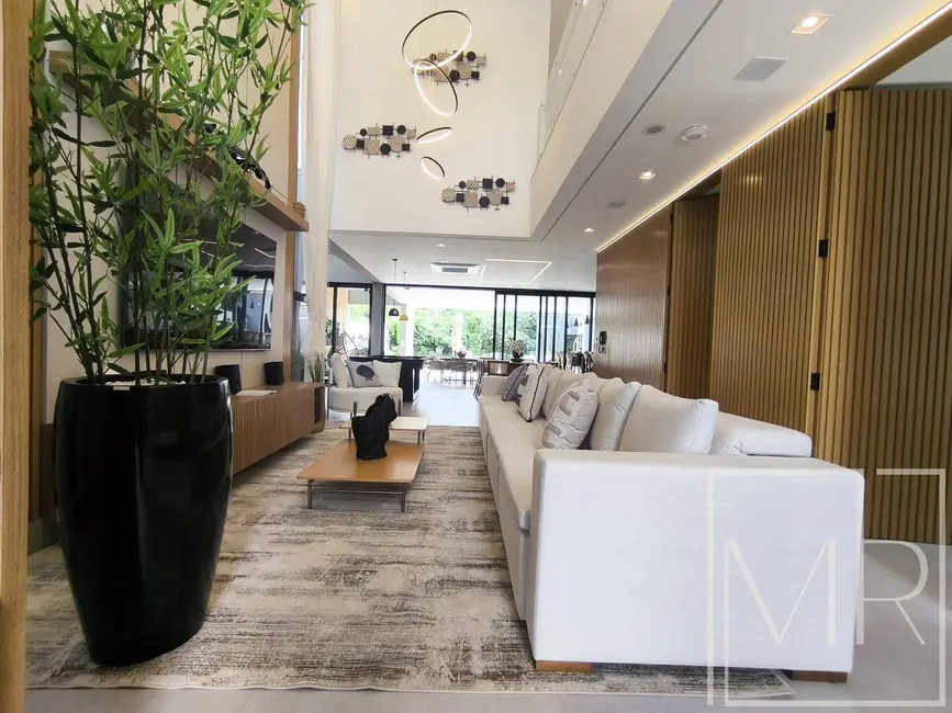 Casa com 6 quartos à venda, 483m2 em Riviera de São Lourenço, Bertioga - SP - imagem 1 Foto 1 de Casa com 6 quartos à venda, 483m2 em Riviera de São Lourenço, Bertioga - SP