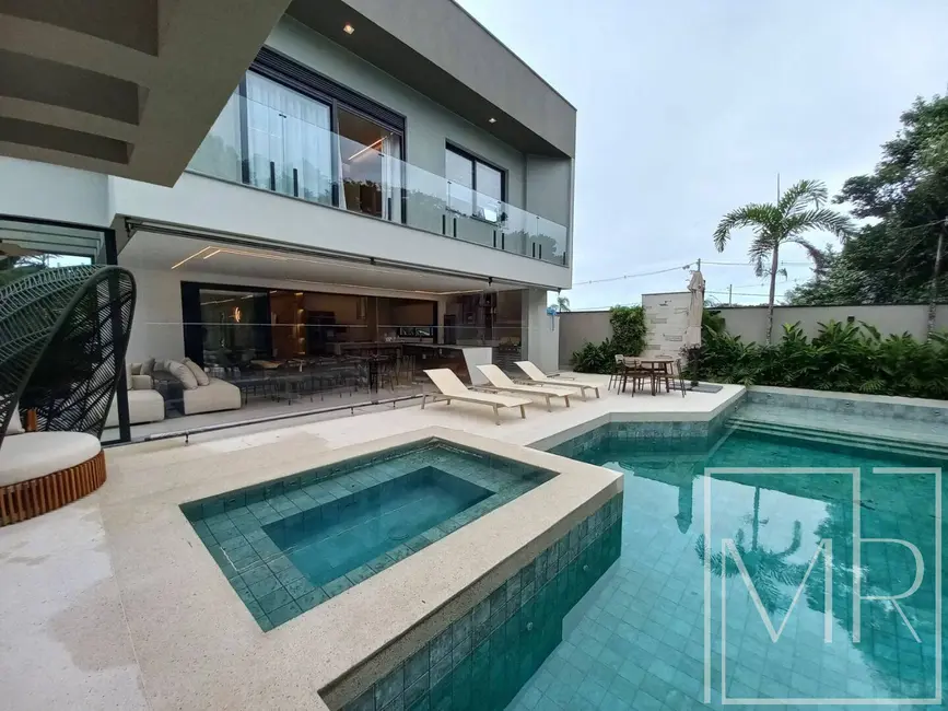 Casa com 6 quartos à venda, 455m2 em Riviera de São Lourenço, Bertioga - SP - imagem 1 Foto 1 de Casa com 6 quartos à venda, 455m2 em Riviera de São Lourenço, Bertioga - SP