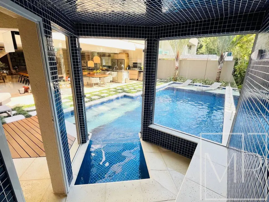 Foto 6 de Casa com 7 quartos à venda, 430m2 em Riviera de São Lourenço, Bertioga - SP