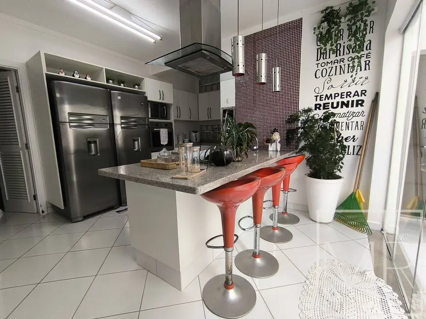 Foto 2 de Casa com 4 quartos à venda e para alugar, 164m2 em Riviera de São Lourenço, Bertioga - SP