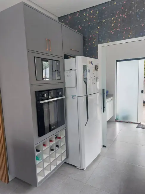 Foto 9 de Casa com 4 quartos à venda, 206m2 em Ubatuba - SP