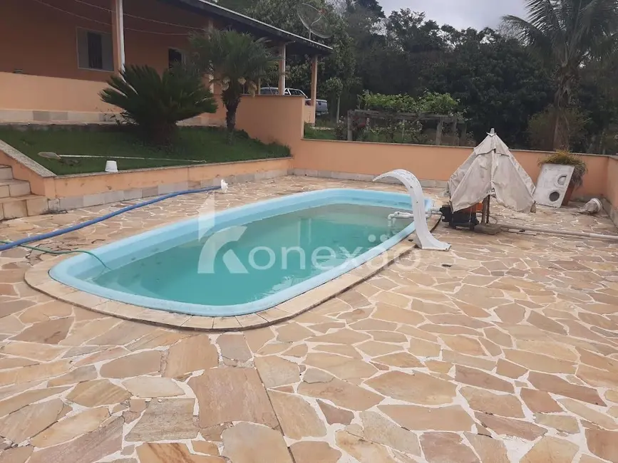 Chácara com 3 quartos à venda, 200m2 em Paraibuna - SP - imagem 1 Foto 1 de Chácara com 3 quartos à venda, 200m2 em Paraibuna - SP