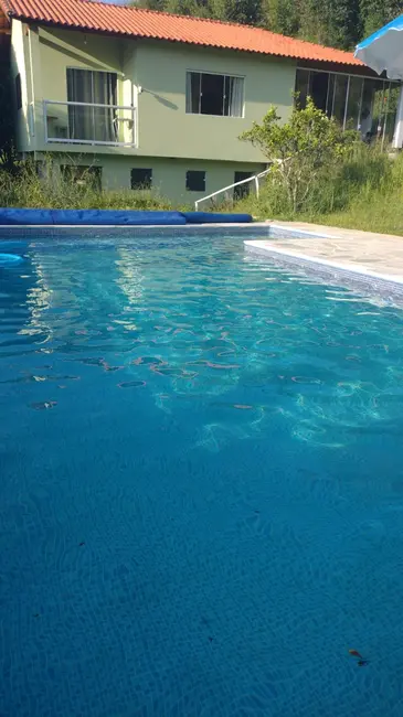 Chácara com 3 quartos à venda, 200m2 em Paraibuna - SP - imagem 1 Foto 1 de Chácara com 3 quartos à venda, 200m2 em Paraibuna - SP