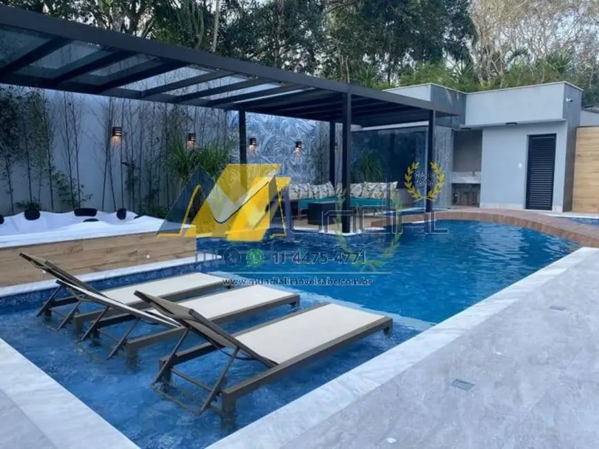 Foto 1 de Casa com 6 quartos à venda, 470m2 em Riviera de São Lourenço, Bertioga - SP