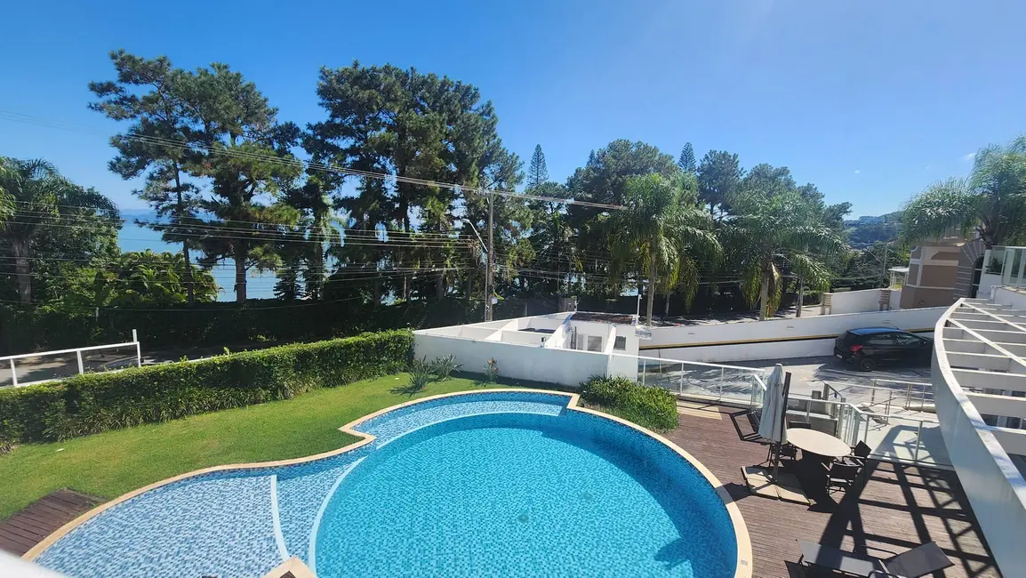 Casa com 4 quartos à venda e para alugar, 235m2 em Cacupé, Florianopolis - SC - imagem 6 Foto 6 de Casa com 4 quartos à venda e para alugar, 235m2 em Cacupé, Florianopolis - SC