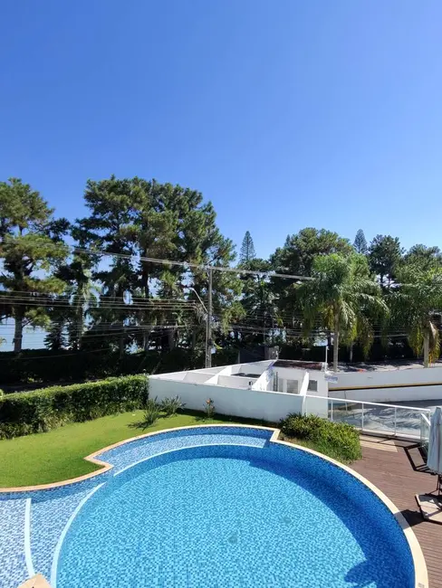 Casa com 4 quartos à venda e para alugar, 235m2 em Cacupé, Florianopolis - SC - imagem 8 Foto 8 de Casa com 4 quartos à venda e para alugar, 235m2 em Cacupé, Florianopolis - SC