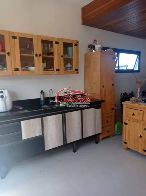 Sobrado com 2 quartos à venda, 93m2 em Pontal de Santa Marina, Caraguatatuba - SP - imagem 2 Foto 2 de Sobrado com 2 quartos à venda, 93m2 em Pontal de Santa Marina, Caraguatatuba - SP