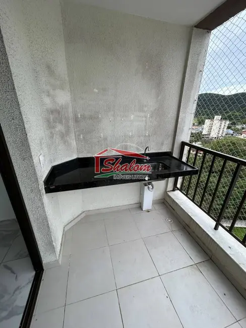 Foto 2 de Apartamento com 2 quartos para alugar, 70m2 em Martim de Sá, Caraguatatuba - SP