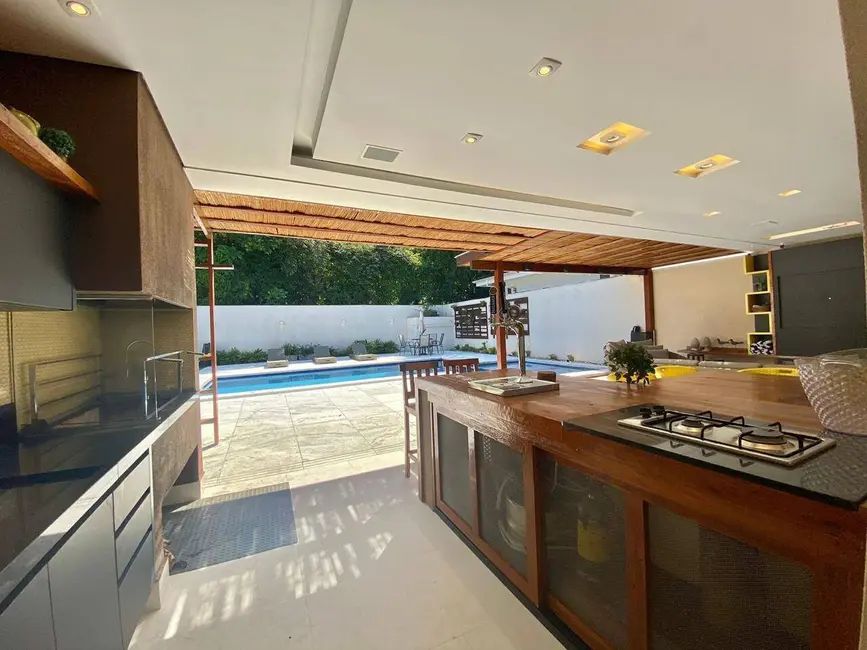 Foto 6 de Casa com 5 quartos à venda, 404m2 em Riviera de São Lourenço, Bertioga - SP