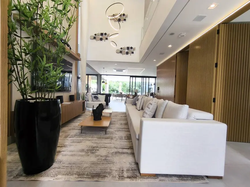 Foto 1 de Casa com 6 quartos à venda, 483m2 em Riviera de São Lourenço, Bertioga - SP