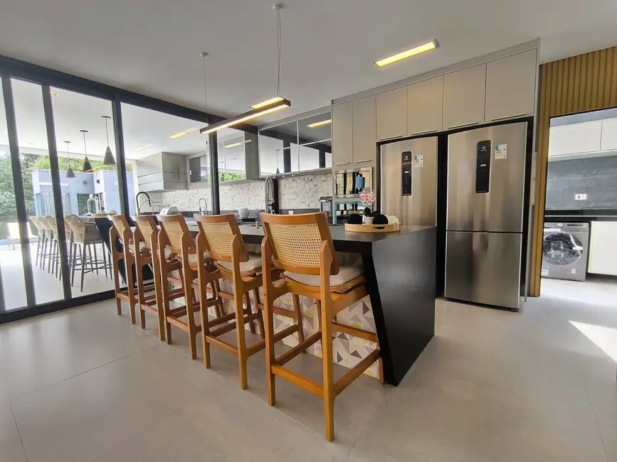 Foto 9 de Casa com 6 quartos à venda, 483m2 em Riviera de São Lourenço, Bertioga - SP