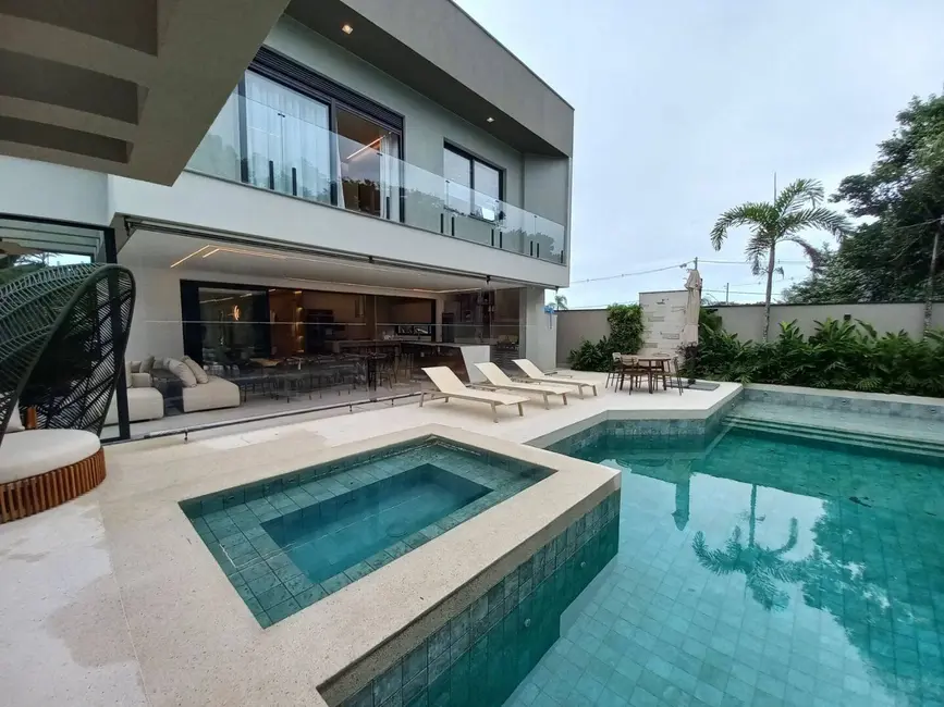 Casa com 6 quartos à venda, 455m2 em Riviera de São Lourenço, Bertioga - SP - imagem 1 Foto 1 de Casa com 6 quartos à venda, 455m2 em Riviera de São Lourenço, Bertioga - SP