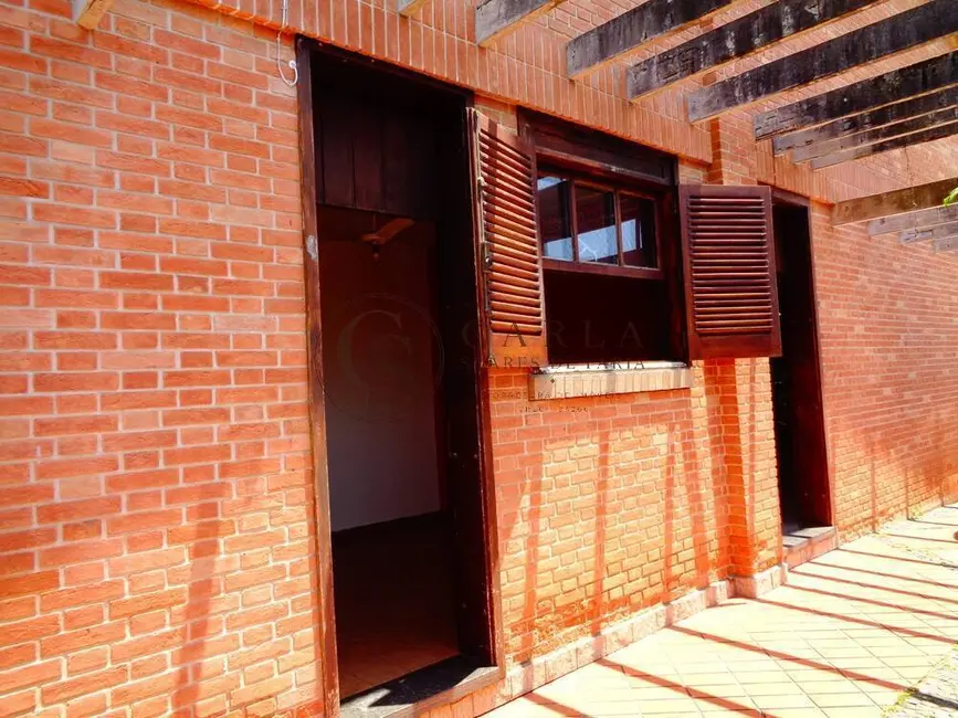 Foto 2 de Casa com 3 quartos à venda, 215m2 em Jardim Virgínia, Guaruja - SP