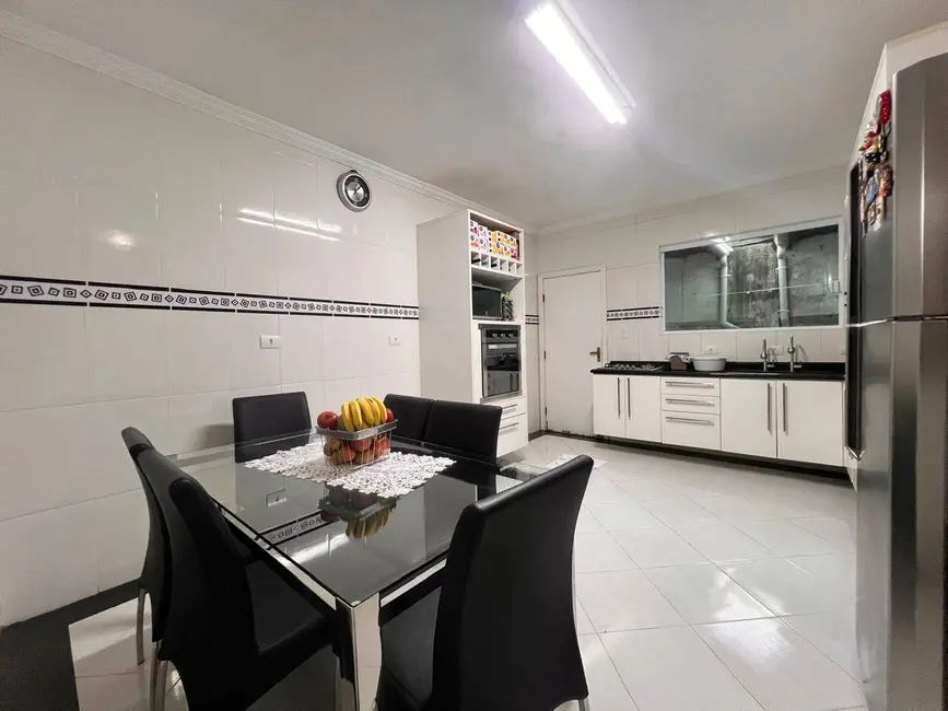 Foto 5 de Sobrado com 3 quartos à venda, 151m2 em Maracanã, Praia Grande - SP