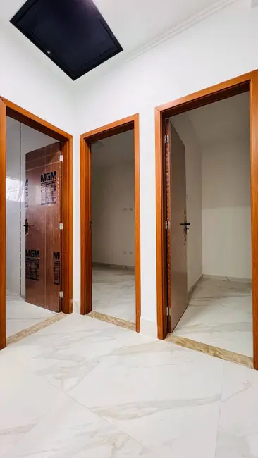 Foto 3 de Casa de Condomínio com 2 quartos à venda, 70m2 em Maracanã, Praia Grande - SP