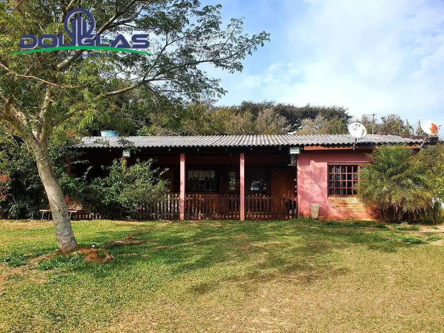 Foto 1 de Casa com 3 quartos à venda em Viamao - RS