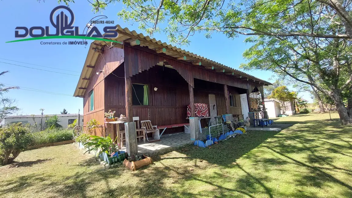 Foto 1 de Casa com 2 quartos à venda, 60m2 em Viamao - RS