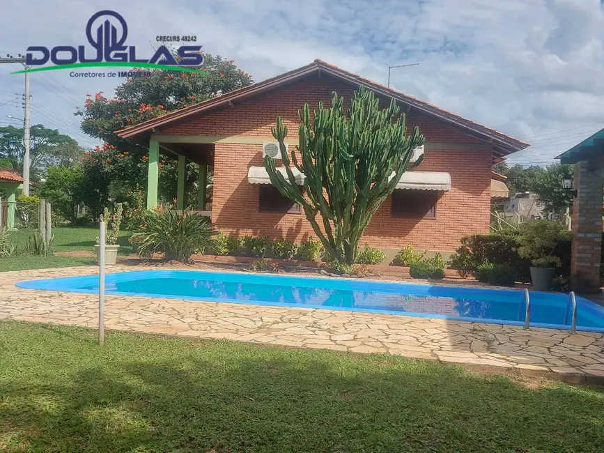 Foto 1 de Casa com 5 quartos à venda em Viamao - RS