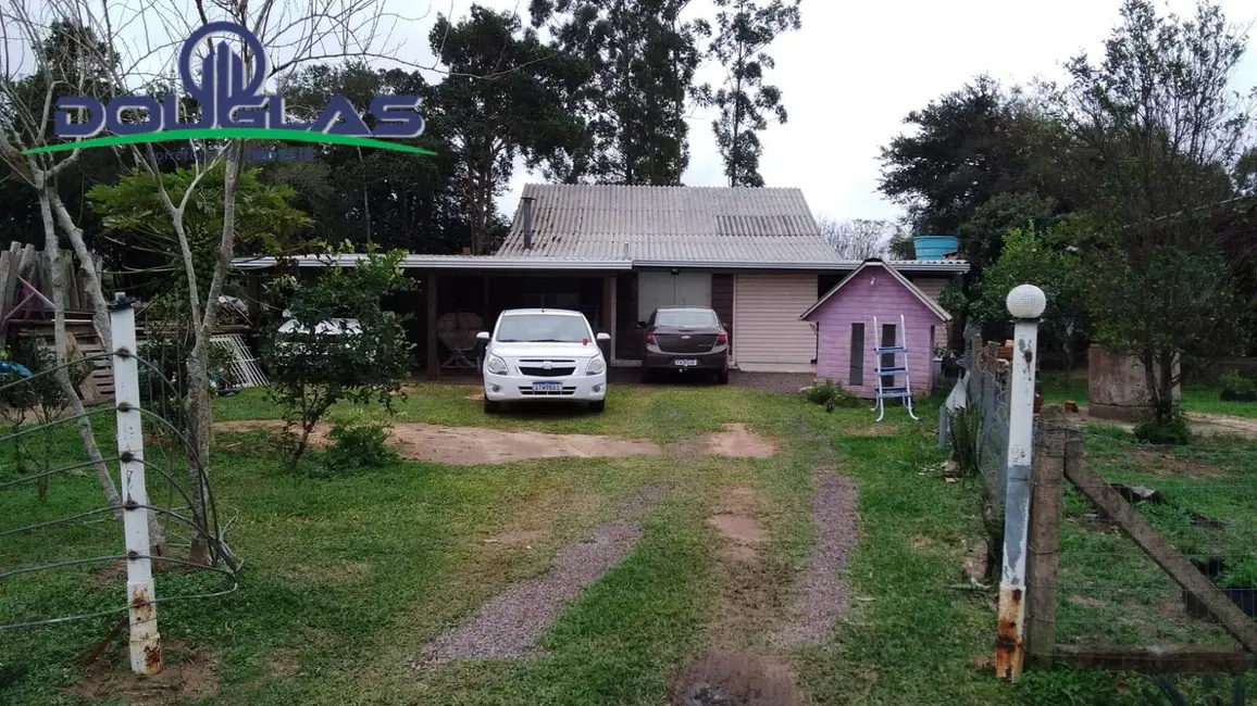 Foto 1 de Casa com 4 quartos à venda em Viamao - RS