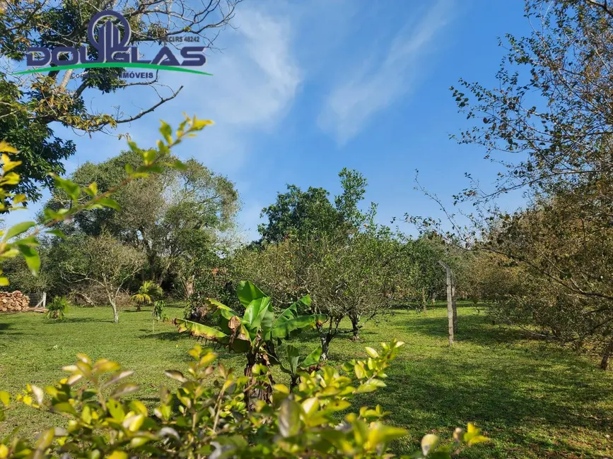 Foto 1 de Terreno / Lote à venda, 595m2 em Viamao - RS
