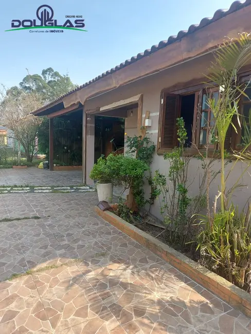 Casa com 3 quartos à venda em Viamao - RS - imagem 1 Foto 1 de Casa com 3 quartos à venda em Viamao - RS