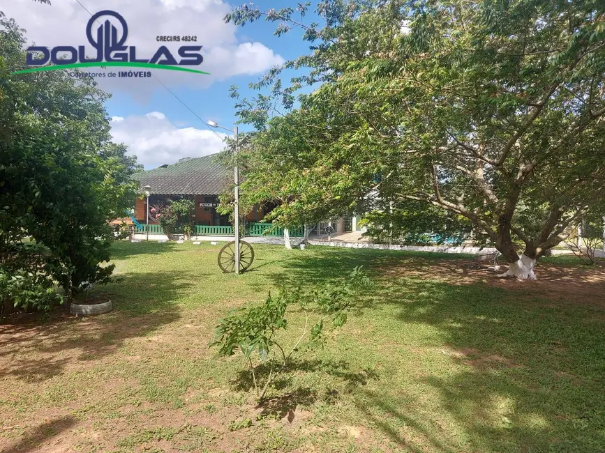 Casa com 2 quartos à venda em Viamao - RS - imagem 2 Foto 2 de Casa com 2 quartos à venda em Viamao - RS