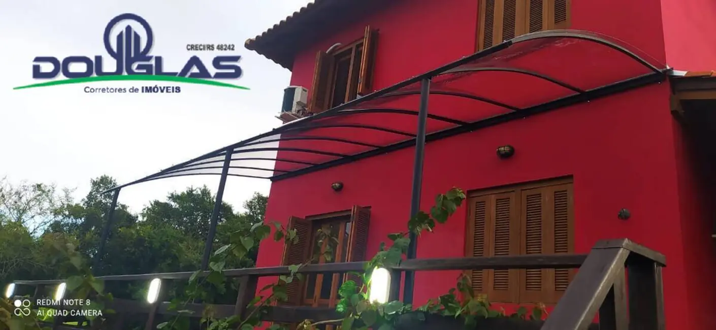 Casa à venda e para alugar em Viamao - RS - imagem 1 Foto 1 de Casa à venda e para alugar em Viamao - RS