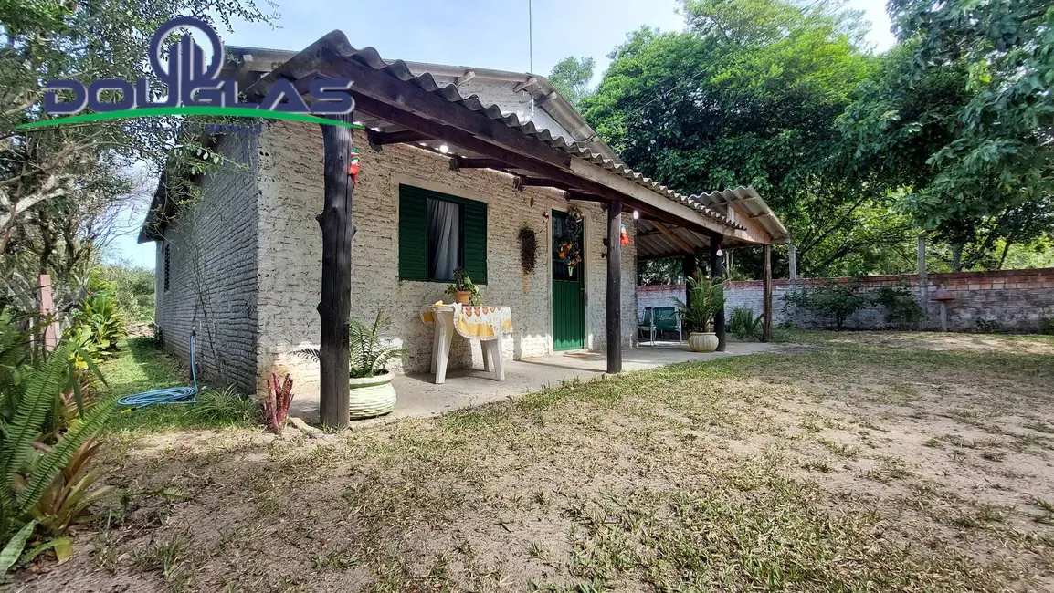 Casa com 2 quartos à venda em Viamao - RS - imagem 1 Foto 1 de Casa com 2 quartos à venda em Viamao - RS