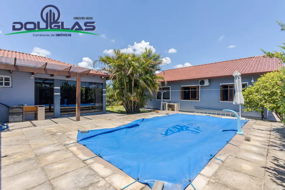 Foto 2 de Casa à venda em Viamao - RS