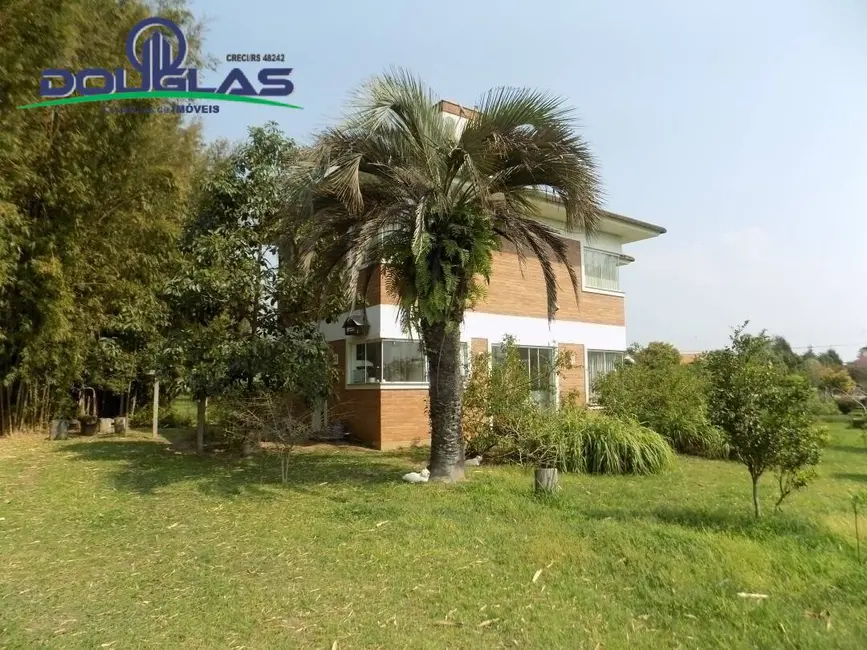 Foto 9 de Casa à venda em Viamao - RS