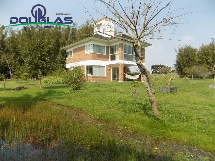 Foto 1 de Casa à venda em Viamao - RS