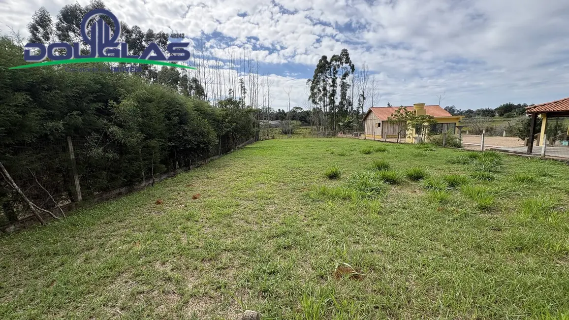 Foto 1 de Terreno / Lote à venda, 700m2 em Viamao - RS