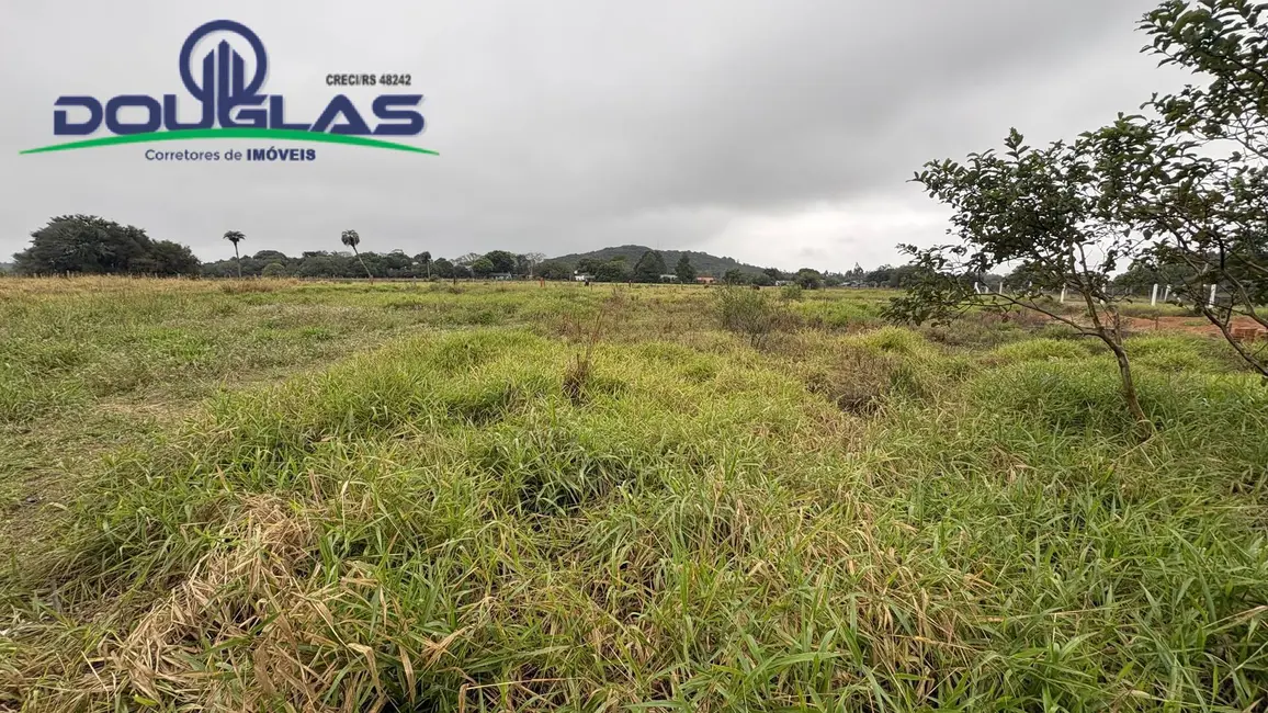 Foto 1 de Terreno / Lote à venda, 600m2 em Viamao - RS
