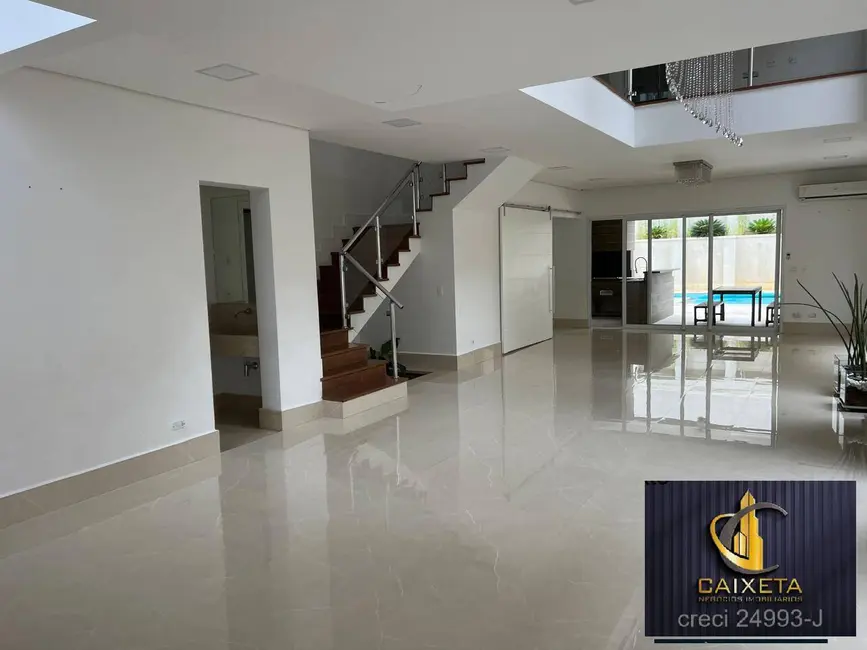 Foto 1 de Casa de Condomínio com 4 quartos à venda e para alugar, 490m2 em Alphaville, Santana De Parnaiba - SP