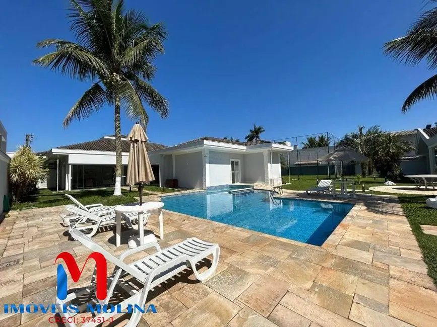 Foto 1 de Casa com 7 quartos à venda e para alugar, 628m2 em Jardim Acapulco, Guaruja - SP