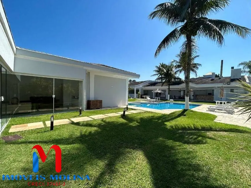 Foto 2 de Casa com 7 quartos à venda e para alugar, 628m2 em Jardim Acapulco, Guaruja - SP