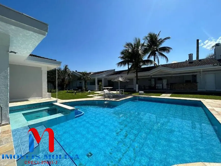 Foto 5 de Casa com 7 quartos à venda e para alugar, 628m2 em Jardim Acapulco, Guaruja - SP